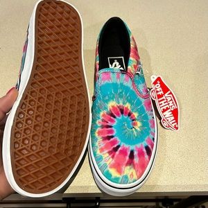 Women’s size 7 tie dye/multi white Asher style vans. Never worn, new w/ tags.